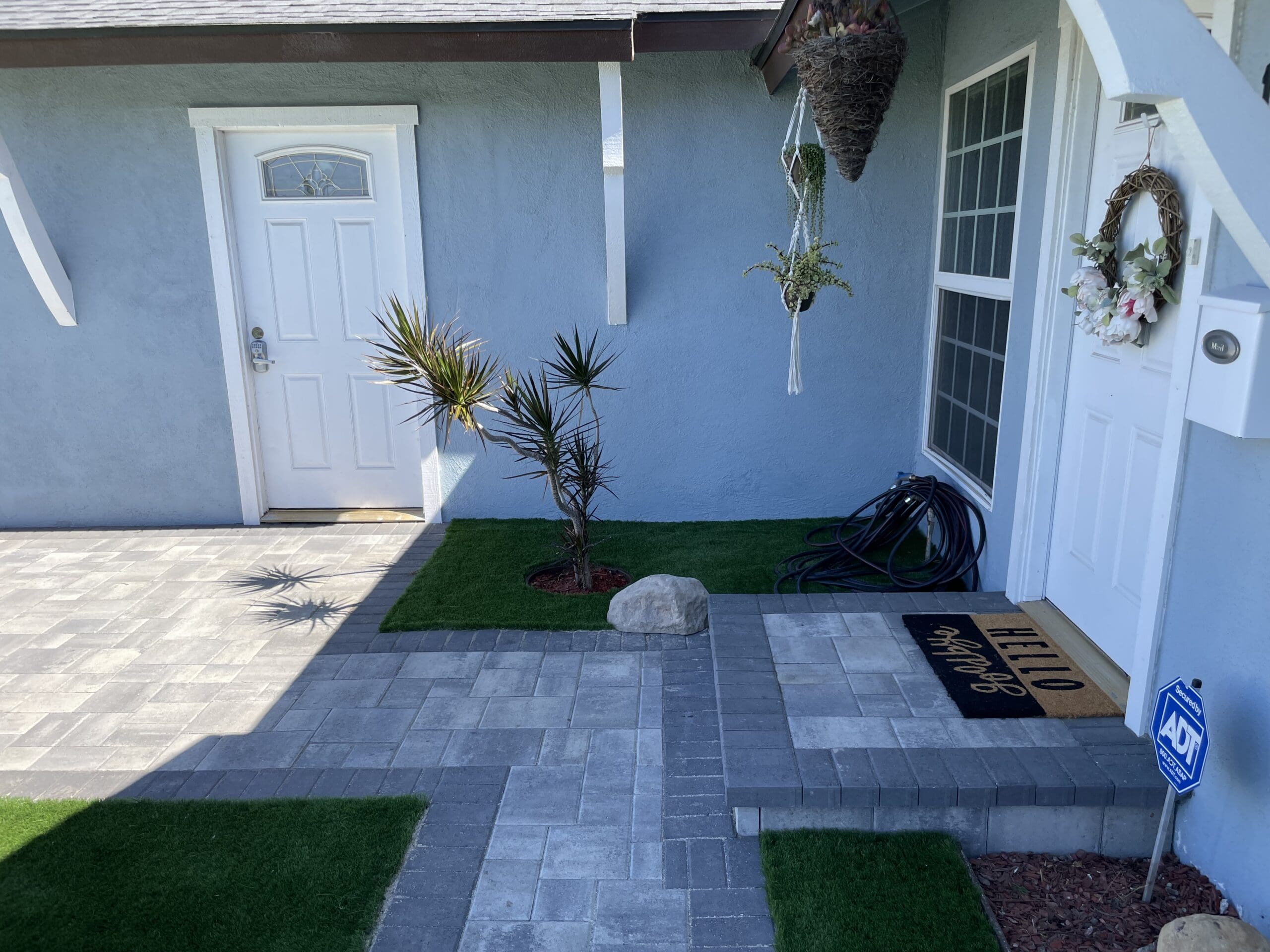 Front yard remodeling with pavers and turf in Los Angeles