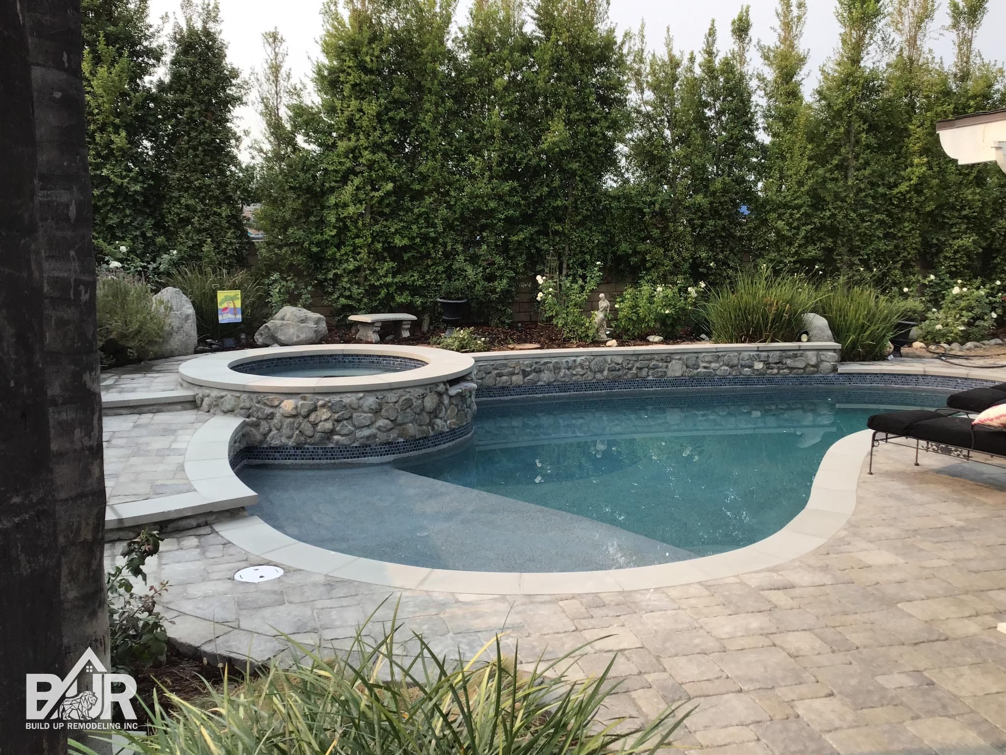 Completed Thousand Oaks pool remodeling project with new Baja shelf and slate stone paver deck