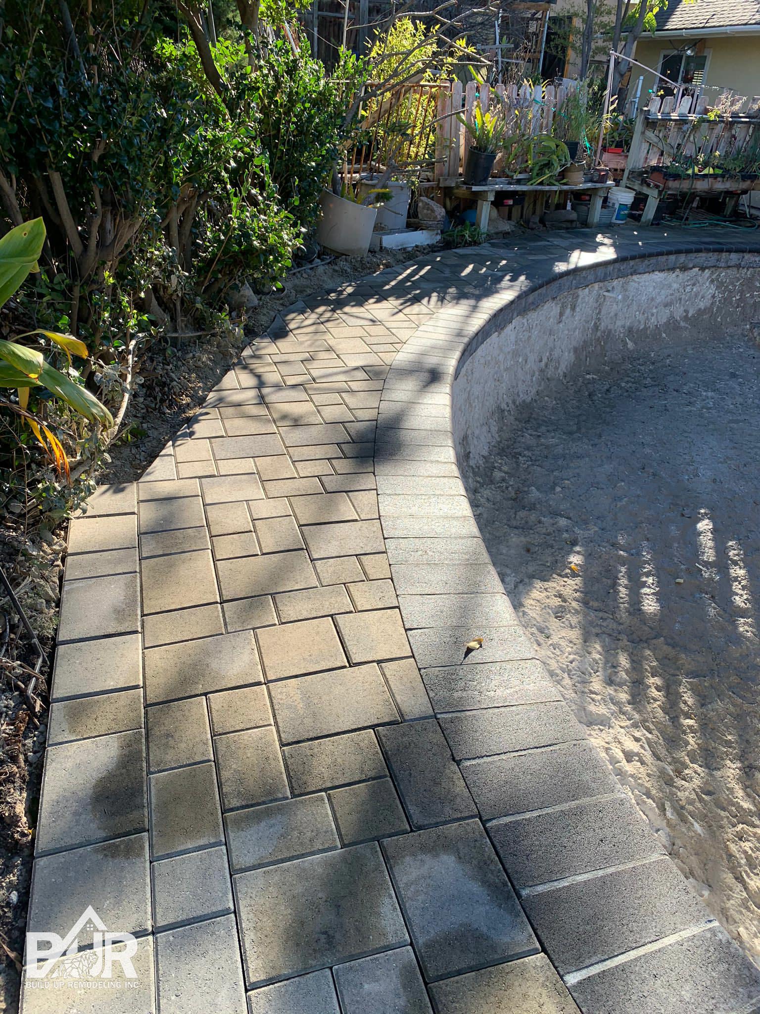 Paver remodeling around Simi Valley swimming pool