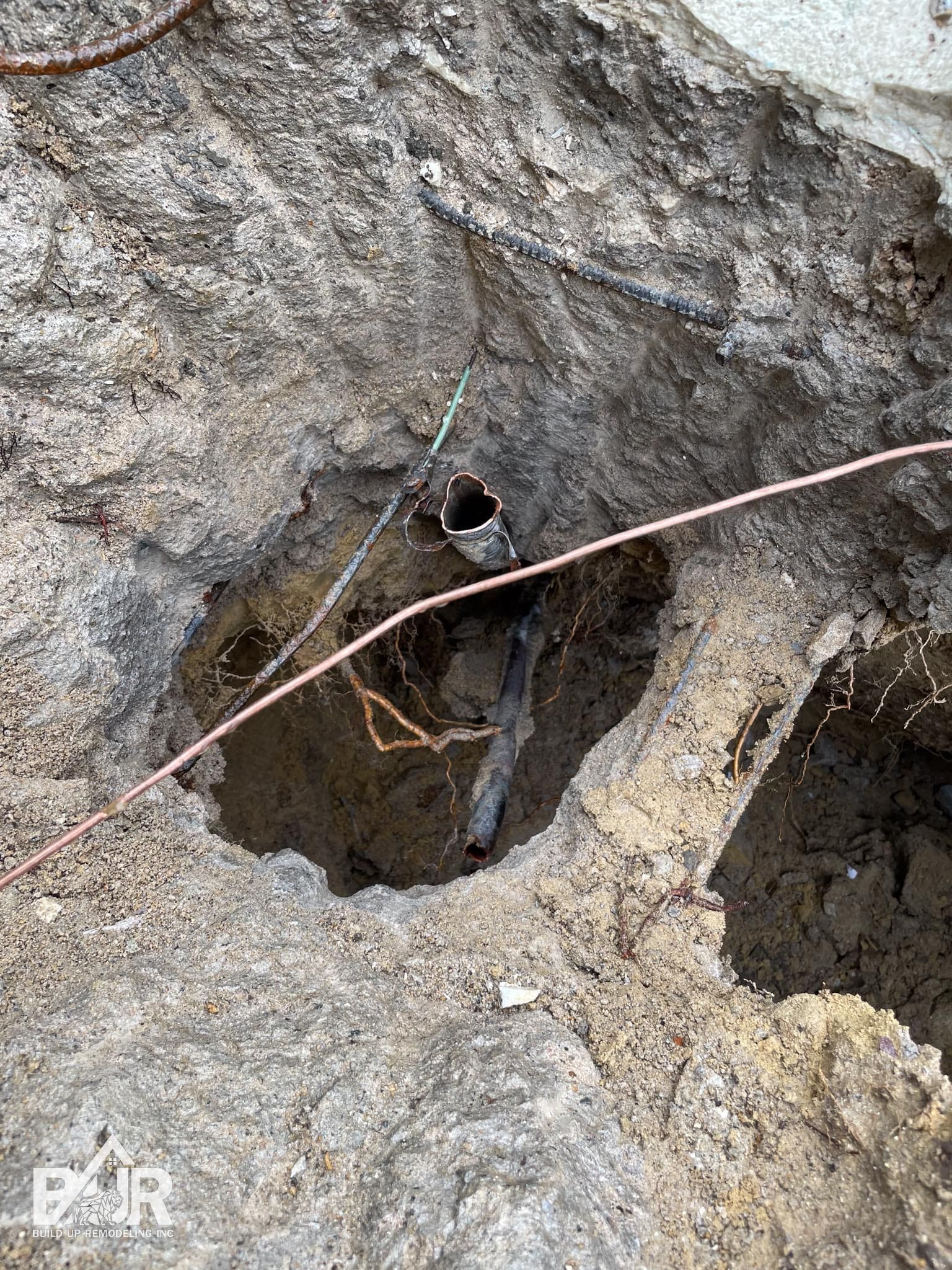 Existing underground plumbing before pool remodel