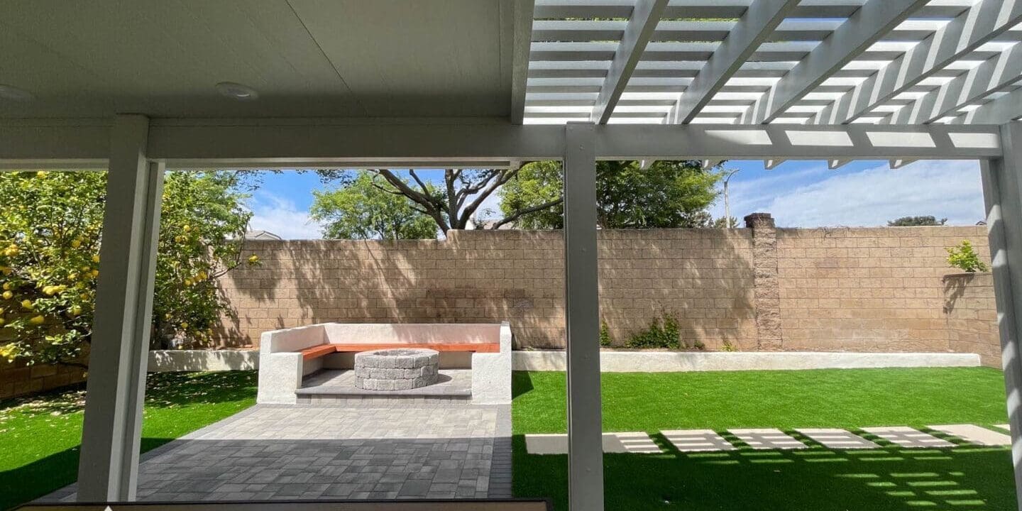 Covered patio with outdoor seating area.